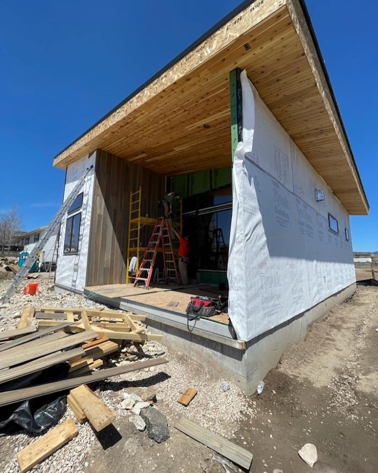 Douglas fir siding is excellent for cabins. For siding this cabin project 1x8 smooth Doug Fir center match with our jasperwood stain of the mountain mist variety. Its soffits use our 1x6 cedar T&G with a natural stain.